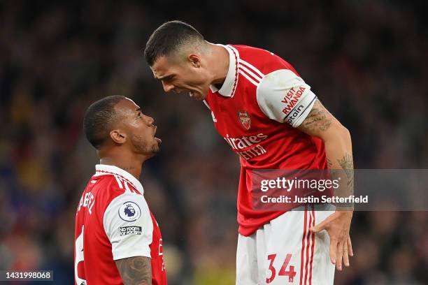 Gabriel Magalhaes and Granit Xhaka of Arsenal celebrate after their sides victory during the Premier League match between Arsenal FC and Liverpool FC...