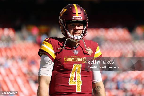 Taylor Heinicke of the Washington Commanders warms up against the Tennessee Titans at FedExField on October 09, 2022 in Landover, Maryland.