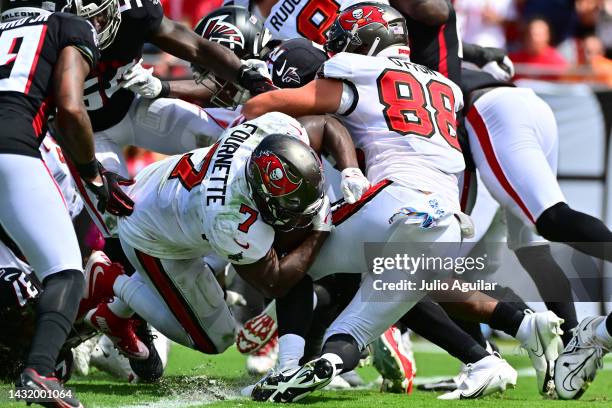 Leonard Fournette of the Tampa Bay Buccaneers scores a touchdown in the second quarter of the game against the Atlanta Falcons at Raymond James...