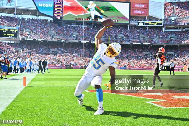 Joshua Kelley of the Los Angeles Chargers celebrates after scoring a touchdown during the second quarter against the Cleveland Browns at FirstEnergy...