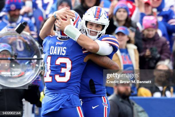 Josh Allen of the Buffalo Bills celebrates with Gabe Davis after a touchdown against the Pittsburgh Steelers during the second quarter at Highmark...