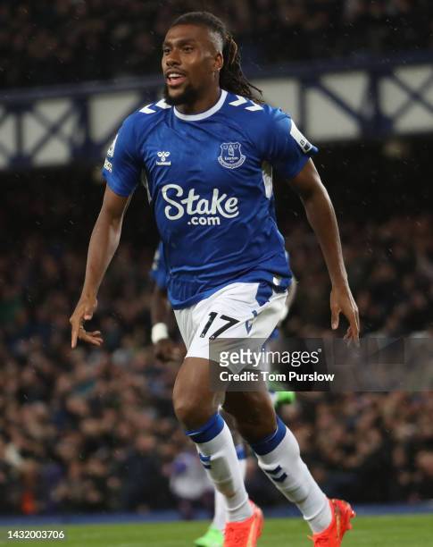 Alex Iwobi of Everton celebrates scoring their first goal during the Premier League match between Everton FC and Manchester United at Goodison Park...