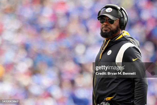 Head coach Mike Tomlin of the Pittsburgh Steelers looks on against the Buffalo Bills during the first quarter at Highmark Stadium on October 09, 2022...