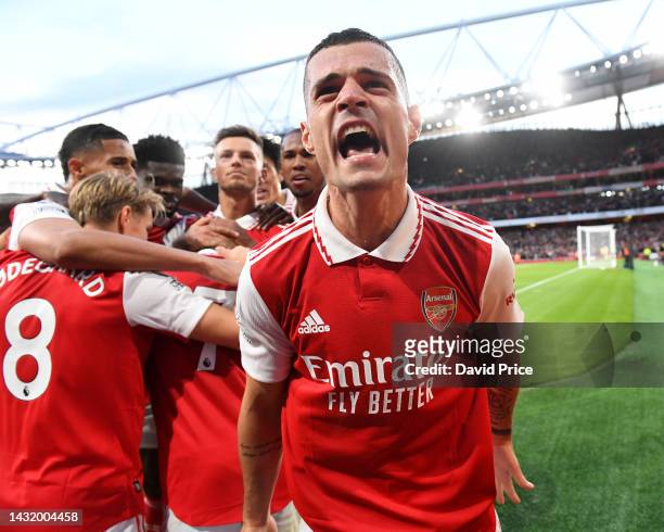 Granit Xhaka celebrates Arsenal's 3rd goal during the Premier League match between Arsenal FC and Liverpool FC at Emirates Stadium on October 09,...