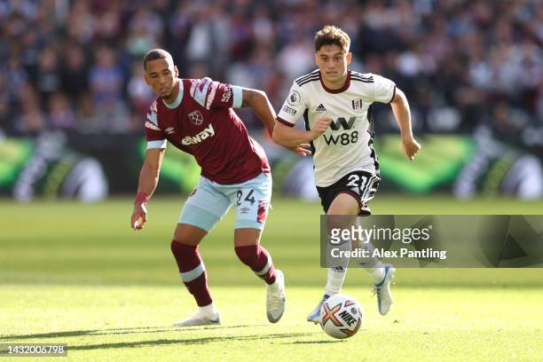 Daniel James of Fulham and Thilo Kehrer of West Ham United during the Premier League match between West Ham United and Fulham FC at London Stadium on...