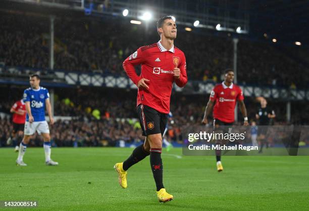 Cristiano Ronaldo of Manchester United celebrates after scoring their team's second goal during the Premier League match between Everton FC and...