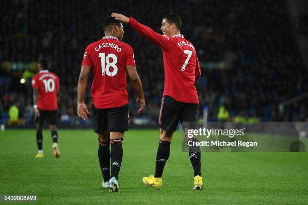 Cristiano Ronaldo celebrates with Casemiro of Manchester United after scoring their team's second goal during the Premier League match between...