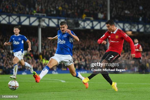 Cristiano Ronaldo of Manchester United celebrates after scoring their team's second goal during the Premier League match between Everton FC and...