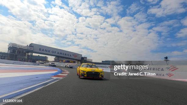 Joey Logano, driver of the Shell Pennzoil Ford, leads the field on a pace lap prior to the NASCAR Cup Series Bank of America Roval 400 at Charlotte...