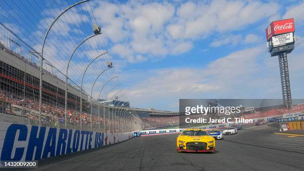 Joey Logano, driver of the Shell Pennzoil Ford, leads the field on a pace lap prior to the NASCAR Cup Series Bank of America Roval 400 at Charlotte...