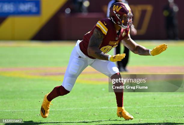 Montez Sweat of the Washington Commanders defends against the Tennessee Titans during the second quarter at FedExField on October 09, 2022 in...