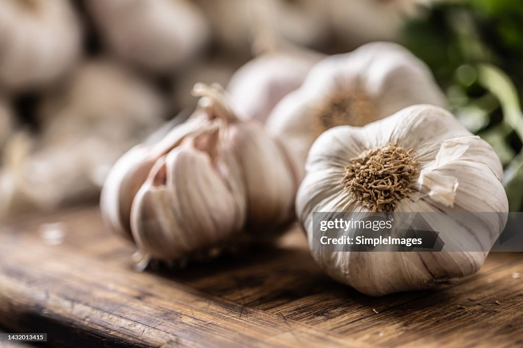 Organic garlic unpeeled ready to be used for cooking in the kitchen.