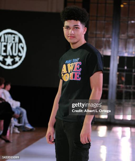 Model wearing Ayden Mekus walks the runway during The Fashion Life Tour during Los Angeles Fashion Week at Alexandria Hotel on October 08, 2022 in...