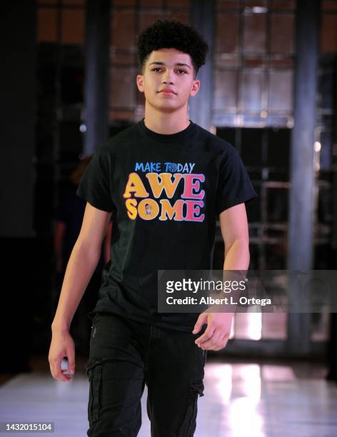 Model wearing Ayden Mekus walks the runway during The Fashion Life Tour during Los Angeles Fashion Week at Alexandria Hotel on October 08, 2022 in...