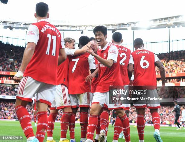 Takehiro Tomiyasu celebrates the 2nd Arsenal goal, scored by Bukayo Saka during the Premier League match between Arsenal FC and Liverpool FC at...