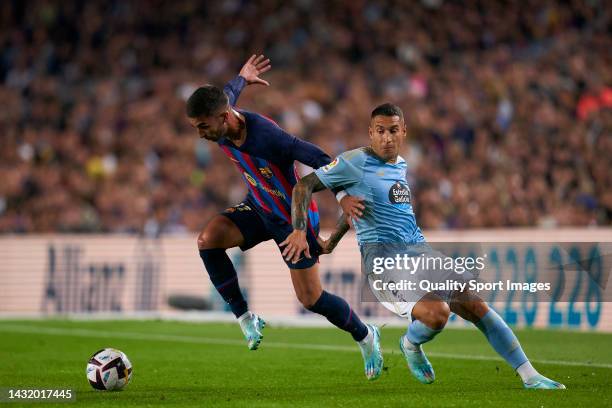 Ferran Torres of FC Barcelona competes for the ball with Hugo Mallo of RC Celta de Vigo during the LaLiga Santander match at Spotify Camp Nou on...