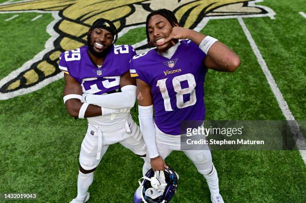 Kris Boyd of the Minnesota Vikings and Justin Jefferson of the Minnesota Vikings celebrate a win against the Chicago Bears at U.S. Bank Stadium on...