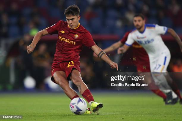 Paulo Dybala of AS Roma scores their team's second goal from the penalty spot during the Serie A match between AS Roma and US Lecce at Stadio...