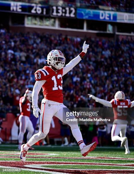 Jack Jones of the New England Patriots celebrates after a play during the fourth quarter against the Detroit Lions at Gillette Stadium on October 09,...