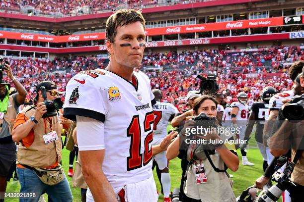Tom Brady of the Tampa Bay Buccaneers walks off the field after defeating the Atlanta Falcons 21-15 at Raymond James Stadium on October 09, 2022 in...