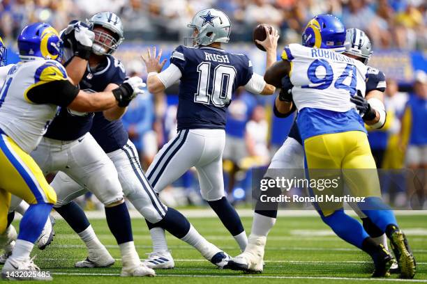 Cooper Rush of the Dallas Cowboys passes against the Los Angeles Rams during the first quarter at SoFi Stadium on October 09, 2022 in Inglewood,...