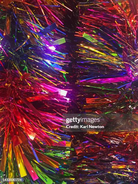 rainbow tinsel - tinsel stock pictures, royalty-free photos & images