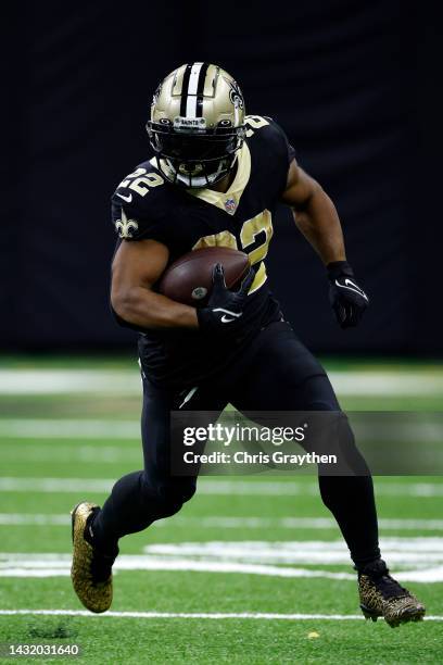 Mark Ingram II of the New Orleans Saints runs with the ball against the Seattle Seahawks at Caesars Superdome on October 09, 2022 in New Orleans,...