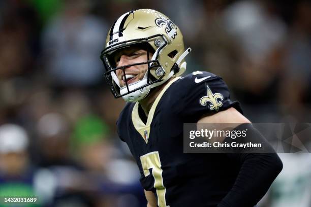 Taysom Hill of the New Orleans Saints reacts after a touchdown against the Seattle Seahawks at Caesars Superdome on October 09, 2022 in New Orleans,...