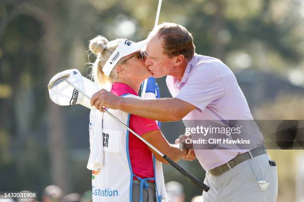 Steve Stricker of the United States celebrates with his wife and caddie Nicki Stricker after winning during the final round of the Constellation...