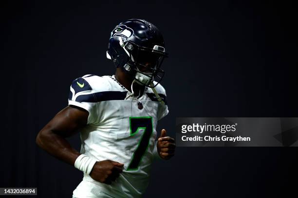 Geno Smith of the Seattle Seahawks walks off the field at half time against the New Orleans Saints at Caesars Superdome on October 09, 2022 in New...