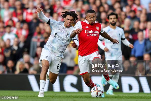 Trent Alexander-Arnold of Liverpool and Gabriel Jesus of Arsenal battle for the ball during the Premier League match at Emirates Stadium on October...
