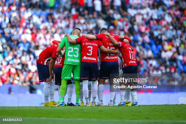 Players of Chivas huddle before the playoff match between Puebla and Chivas as part of the Torneo Apertura 2022 Liga MX at Cuauhtemoc Stadium on...