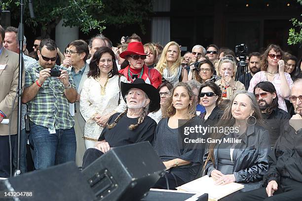 Seated musician Willie Nelson, his wife Annie Nelson and sister Bobbie Nelson before the unveiling of Willie's statue at ACL Live on April 20, 2012...