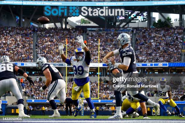 Cooper Rush of the Dallas Cowboys passes against the Los Angeles Rams during the third quarter at SoFi Stadium on October 09, 2022 in Inglewood,...