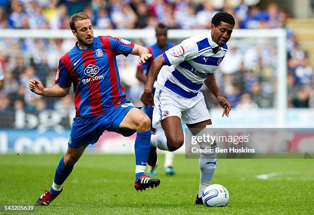 Glenn Murray of Crystal Palace battles with Mikele Leigertwood of Reading during the npower Championship match between Reading and Crystal Palace at...