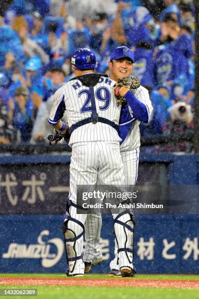 Yasuaki Yamasaki and Hikaru Ito of the Yokohama DeNA Baystars celebrate their 1-0 victory in the Central League Climax Series First Stage Game Two at...