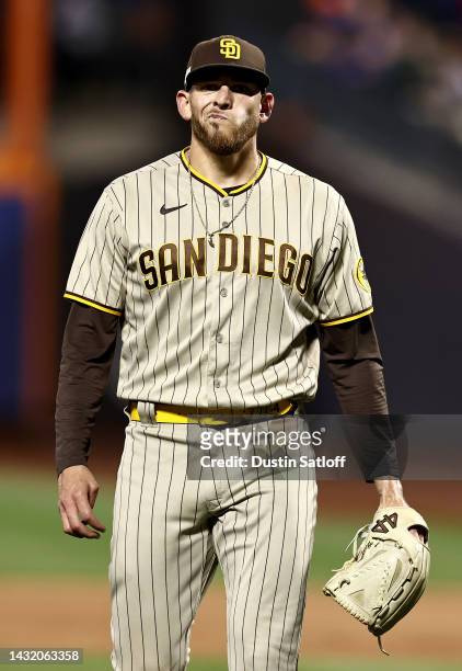 Joe Musgrove of the San Diego Padres walks back to the dugout after closing out the fifth inning against the New York Mets in game three of the...