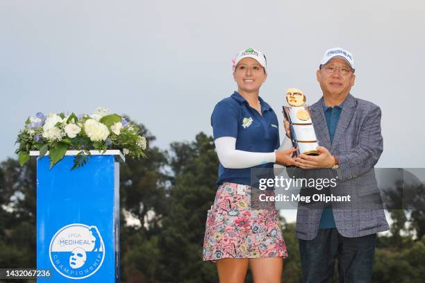 Jodi Ewart Shadoff of England poses with the trophy and Chairman of MEDIHEAL Oh Sub Kwon after winning the LPGA MEDIHEAL Championship at The Saticoy...