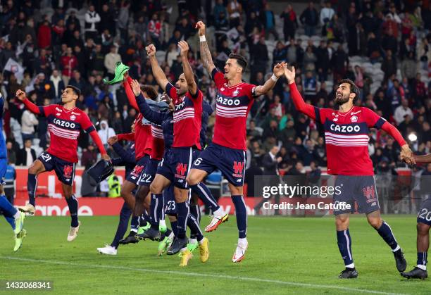 Benjamin Andre, Ismaily Goncalves dos Santos, Jose Fonte, Andre Gomes of Lille and teammates celebrate the victory following the Ligue 1 match...