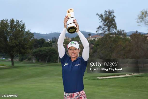 Jodi Ewart Shadoff of England poses with the trophy on the 18th green after winning the LPGA MEDIHEAL Championship at The Saticoy Club on October 09,...