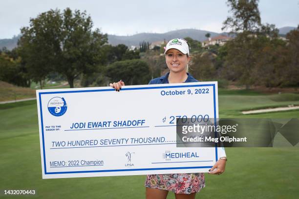Jodi Ewart Shadoff of England poses with the check on the 18th green after winning the LPGA MEDIHEAL Championship at The Saticoy Club on October 09,...