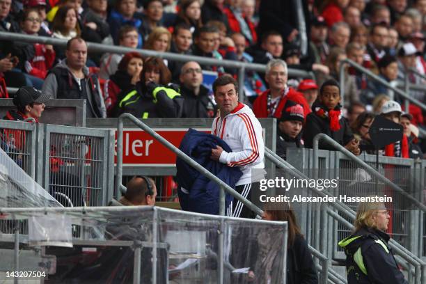 Dieter Hecking, head coach of Nuernberg leaves the arena during the Bundesliga match between 1.FC Nuernberg and Hamburger SV at Easy Credit Stadium...