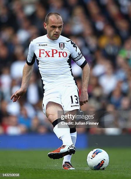 Danny Murphy of Fulham with the ball during the Barclays Premier League match between Fulham and Wigan Athletic at Craven Cottage on April 21, 2012...