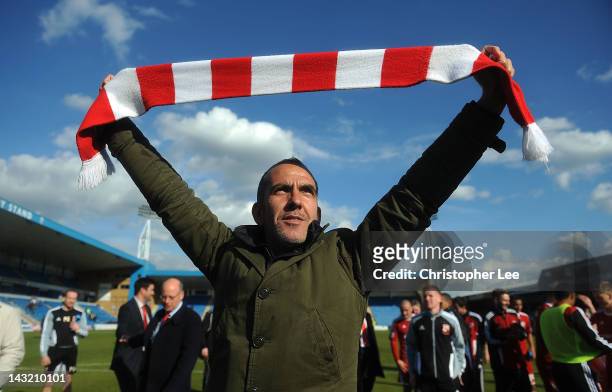 Manager Paolo Di Canio of Swindon celebrates their promotion during the npower League 2 match between Gillingham and Swindon Town at Priestfield...