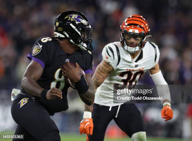 Lamar Jackson of the Baltimore Ravens rushes against the Cincinnati Bengals in the third quarter at M&T Bank Stadium on October 09, 2022 in...