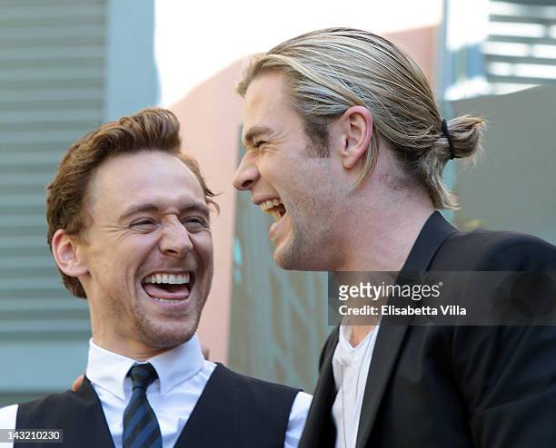 Actors Tom Hiddleston and Chris Hemsworth attend "The Avengers" photocall at De Russie Hotel on April 21, 2012 in Rome, Italy.