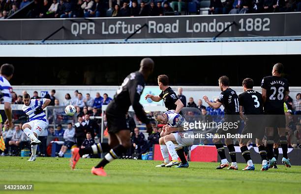 Adel Taarabt of QPR scores the opening goal from a free kick during the Barclays Premier League match between Queens Park Rangers and Tottenham...
