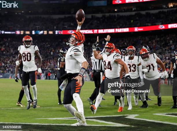 Joe Burrow of the Cincinnati Bengals reacts after rushing for a touchdown against the Baltimore Ravens in the fourth quarter at M&T Bank Stadium on...