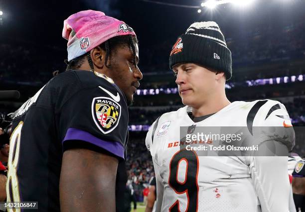 Joe Burrow of the Cincinnati Bengals reacts after their 19-17 loss to Lamar Jackson of the Baltimore Ravens at M&T Bank Stadium on October 09, 2022...