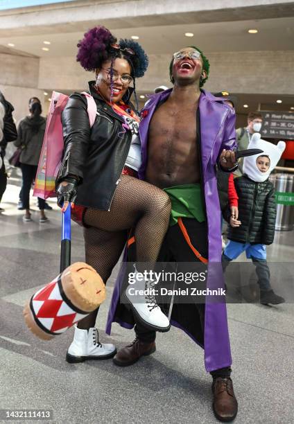Cosplayers pose as Harley Quinn and Joker during day 4 of New York Comic Con on October 09, 2022 in New York City.